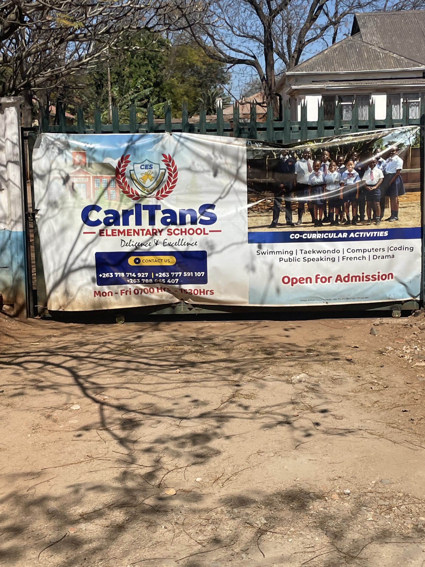 CarlTanS Elementary School entrance gate and signage